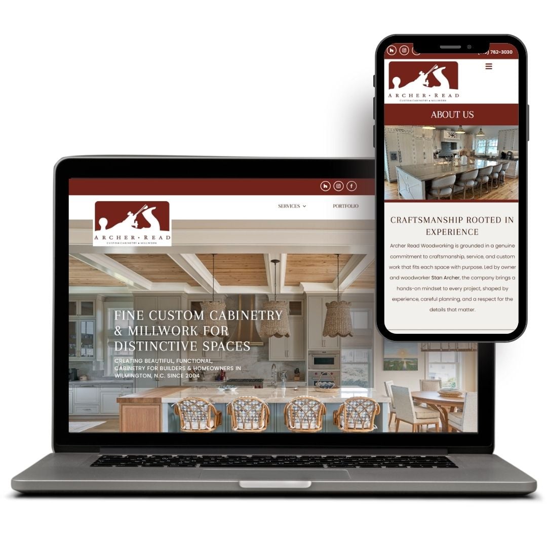 Laptop and smartphone displaying a website design for custom cabinetry, featuring text about craftsmanship and distinctive spaces.